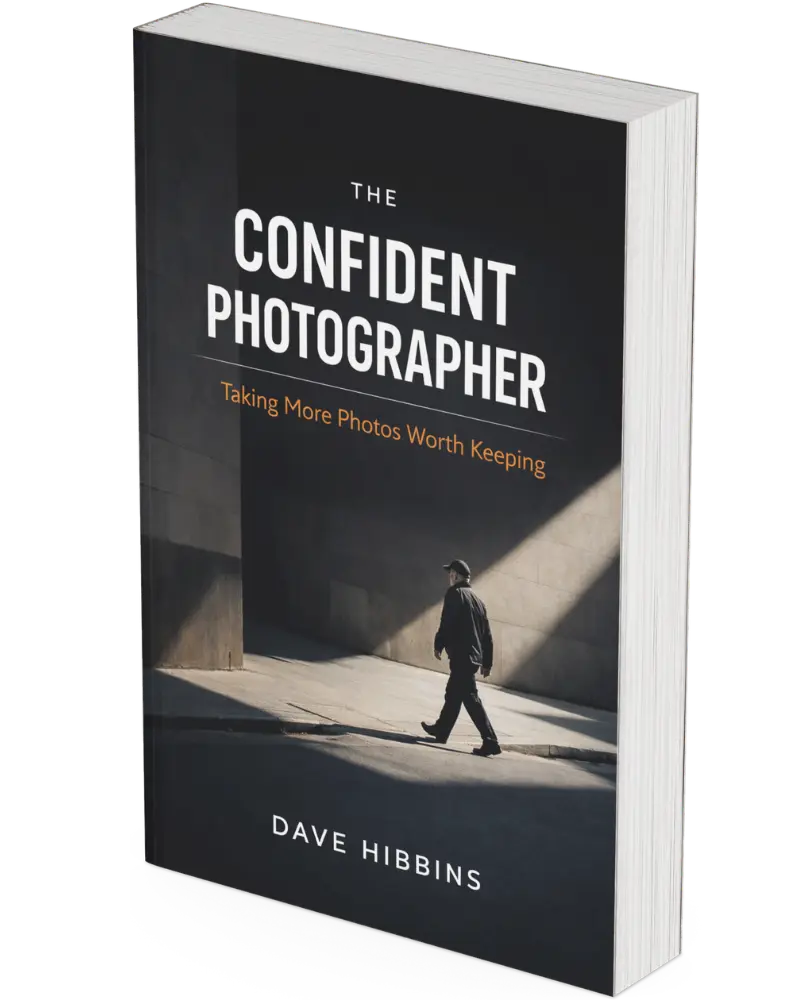 3D mockup of The Confident Photographer book showing minimalist street photography cover